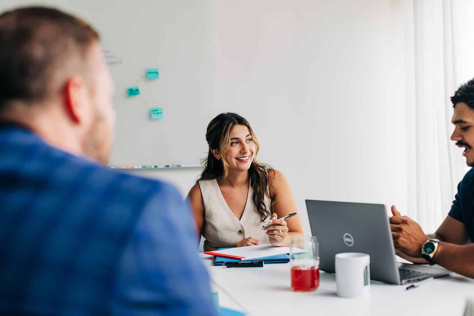 Group discussion in a meeting room.